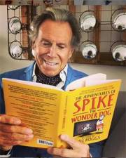 Bill Boggs and his book “The Adventures of Spike the Wonder Dog.” Photo courtesy of Bill Boggs