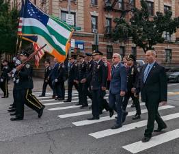 Color guard heads into St. Elizabeth’s Church, as they have every year at a memorial service celebrating Police Officers Michael Buczek and Christopher Hoban were killed only hours apart on the UWS on October, 18, 1988. Photo: Brian Berger