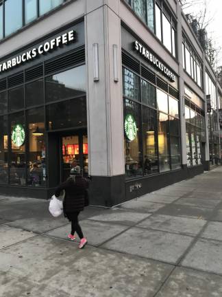 A Starbucks on Columbus Avenue at West 100th Street. The coffee chain operates 231 shops in Manhattan and holds the No. 1 position in the listings of the borough's top 10 national retailers.