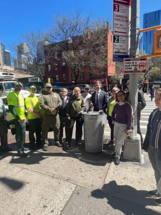 Council Member Erik Bottcher and Commissioner Jessica Tisch posing with an ideally rat-proof trash bin. They were joined on the corner of 9th Ave. &amp; 43rd St. by Chelsea residents and sanitation workers.