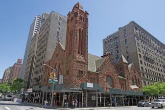 <b>The crumbling façade of West Side Presbyterian Church has necessitated scaffolding sheds to be placed around the building for years. The few people left in the congregation say repairs are beyond their ability to pay and want to sell the landmarked 160-year-old church.</b> Photo: nylandmarks.org