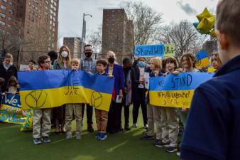 Council Members Gale Brewer and Shaun Abreu (center) posed with P.S. 145 students during a rally in support of Ukraine on Monday, March 7. Photo: Abigail Gruskin