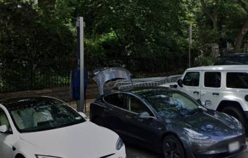 <b>The Level 2 FLO charger in action at 170 E. End Ave. in Manhattan. A DOT report that included this charging location measured a 99.9 percent reliability–or uptime–rate</b>. Photo: Google Street View.