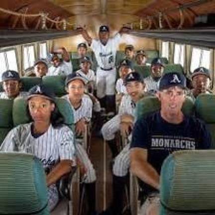 <b>On the road with her travel baseball team, the Monarchs, as a 13 year old.</b> Photo: Courtesy Steve Bandura