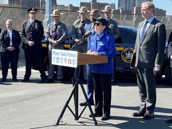 <b>As Mayor Adams and MTA CEO Janno Lieber look on at the Press Event on March 12, Governor Hochul noted to ghost car drivers “ if you attempt to alter your license plate to avoid traffic cameras and toll readers, you will be caught.”</b> Photo: Ralph Spielman