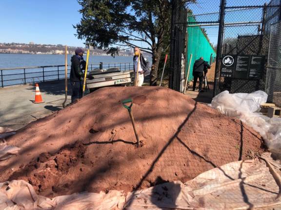 To celebrate the first day of spring, Riverside Park Conservancy held its annual “Clay Date” – marking the delivery of seven tons of red clay for New York’s only outdoor public red clay tennis courts. Photo courtesy of Riverside Park Conservancy