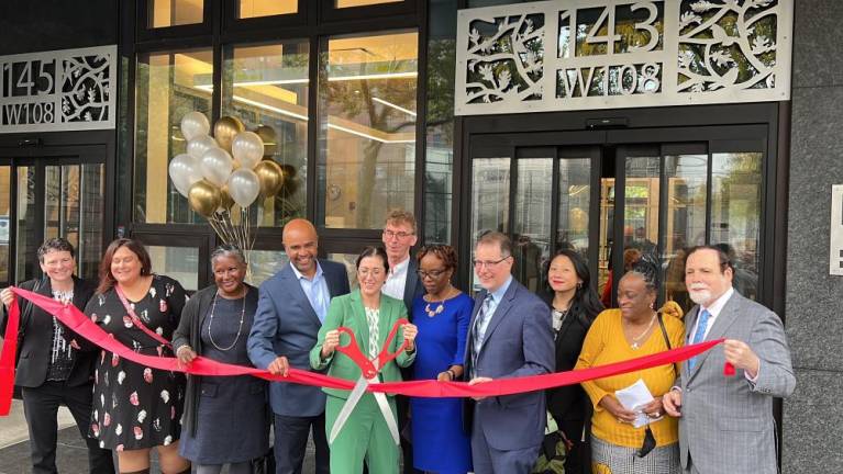 Community members, advocates and elected officials were on hand to celebrate the ribbon-cutting on West 108th Street. Photo: Armando Sanchez