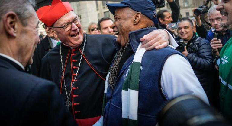 <b>Cardinal Timothy Dolan greets Mayor Eric Adams outside St. Patrick’s Cathedral on March 16 at the 263rd annual St. Patrick’s Day Parad</b>e. Photo: NYC Mayor’s Office/Flickr