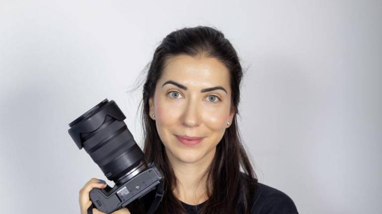 When Anna Meshcheri arrived in the US from Russia, she thought she’d land a 9-to-5 office job, but when that didn’t materialize, she turned to creative pursuits and now is a fashion photographer with a studio in Times Square. Photo: Times Square Photo Studio