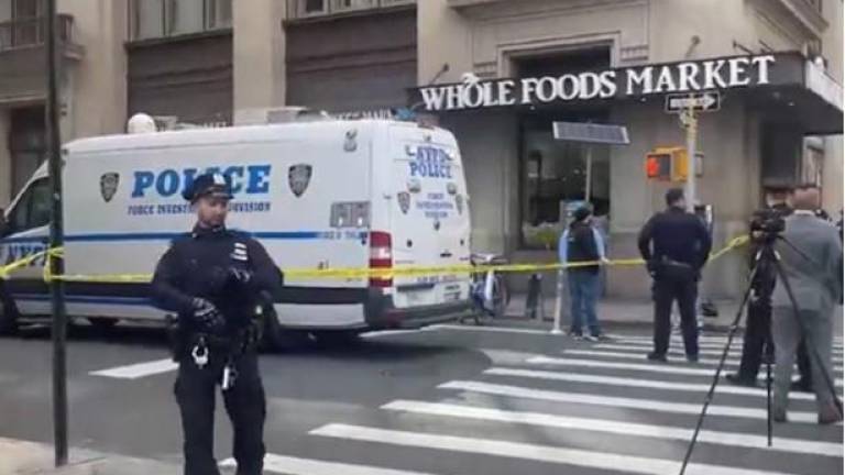 Police roped off the area on the corner of Seventh Ave. and 24th St., following a violent struggle with a suspect who was shot dead by a three member law enforcement task force who attempted to apprehend him. Photo: Citizen app.