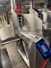 Under the new 2025-2029 MTA Capital Program, 150 more stations will have new anti-fare evasion turnstiles like this one at the Times Square Station, with fins and paddles.