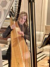 Kirsten Agresta-Copely, who started playing harp when she was only five, is now a principal harpist at the Radio City Christmas Spectacular, has been nominated for her first Grammy Award and during a storied career has played with everyone from Beyonce to Lady Gaga. Photo: Courtsey Kirsten Agresta-Copely