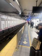 Gov. Hochul said her budget will allocate money to install 85 more saftery barriers on platforms in the NYC subway system. The above shows safety barriers at the Eighth Ave. and 14th St. subway station in Manhattan.