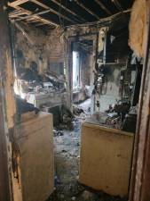 <b>The Fierro’s kitchen after the devastating fire raced through the clutter-filled SOHO apartment on May 29.</b> Photo: SoHo guy