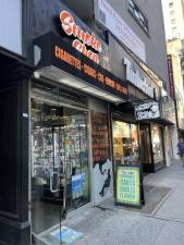 A smoke shop in Midtown advertises a variety of weed-related products. Photo: Kay Bontempo