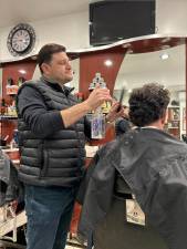 Barber Shop 72 owner Rafael Ibragimov says many customers are coming in and asking for a Timothée Chalamet-style mustache trim.