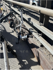 Image of the broken Factor bicycle and electric scooter following the collision.