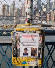 Flyer for missing Long Island boy, Thomas Medlin, on the Manhattan Bridge.