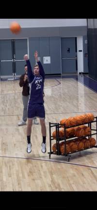 Matt Volkening gets some airtime during his own go at the three-point contest.