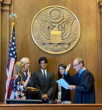 Jack Schlossberg (center) turned up at the influential Lexington Democratic fall social and is said to be considering a run for Jerry Nadler’s Congressional seat next year. He has not held elected office but has been around politics his whole life. Here, he watches his mom, Caroline Kennedy Schlossberg, being sworn in as ambassador to Australia in 2022.