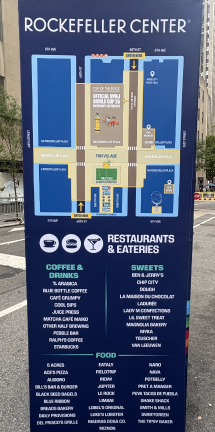 Maps and guides for Fan Village line the streets surrounding Rockefeller Center.