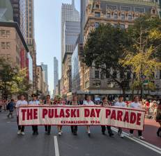 The Pulaski Day Parade, established in 1936 (but first held the year after), on Fifth Avenue.