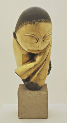 Constantin Brancusi.&#xa0;&quot;Mademoiselle Pogany.&quot; version I, 1913 (after a marble of 1912). Bronze with black patina 17 1/4 x 8 1/2 x 12 1/2?, on limestone base 5 3/4 x 6 1/8 x 7 3/8?. The Museum of Modern Art, New York. Acquired through the Lillie P. Bliss Bequest (by exchange). &#xa9; 2018 Artists Rights Society (ARS), New York / ADAGP, Paris. Photo:&#xa0; Imaging and Visual Resources Department, MoMA &quot;Mademoiselle Pogany&quot; is a portrait of Hungarian artist Margit Pogany, who studied painting in Paris. It was carved from memory in marble in 1912 and later cast in bronze.