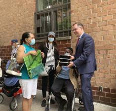 Manhattan Borough President Mark Levine handing out meals, COVID tests, masks and sanitizers in Morningside Heights, June 2, 2022. Photo: Mark D. Levine on Twitter