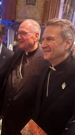 Cardinal Timothy Dolan, who recently stepped down as leader of the Archdiocese of New York and Archbishop Ronald Hicks, who succeeded him earlier this month made a joint appearance at the State of the NYPD address delivered by Jessica Tisch on Feb. 10.