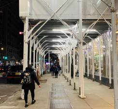 Tall, well-lit construction sheds may become the norm for the city’s 9,000 scaffolding installations if new regulations proposed by City Council majority leader Keith Powers and council member Erik Bottcher, Shaun Abreu, and Chris Marte become law. Manhattan, with 4,000 of the sheds, has more than any other borough. Photo: Ralph Spielman