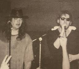 Shane MacGowan (right) as he began his comeback bid after getting tossed from the Pogues, the group he co-founded in the early 90s. He teamed up in NYC with Rogue’s March front man Joe Hurley (left) for a sold out residency at the nightclub Bang On in September 1992. Photo: Sue Graves