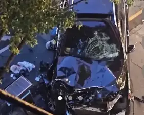 A black Mercedes-Benz SUV allegedly driven by Elvin Suarez came to rest on Amsterdam Avenue after the May 15 crash that killed two people and injured three others. A Manhattan grand jury has since indicted Suarez on aggravated vehicular homicide and other charges.