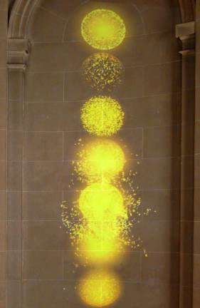 Shahzia Sikander's video &quot;Gold Oasis&quot; fills the space with dancing light and ethereal sound, while delivering a poignant message. Photo: Adel Gorgy