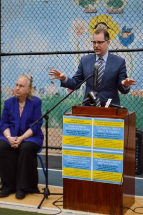 Manhattan Borough President Mark Levine (at podium) and Upper West Side Council Member Gale Brewer (left) delivered remarks alongside other elected officials and community members. Photo: Abigail Gruskin