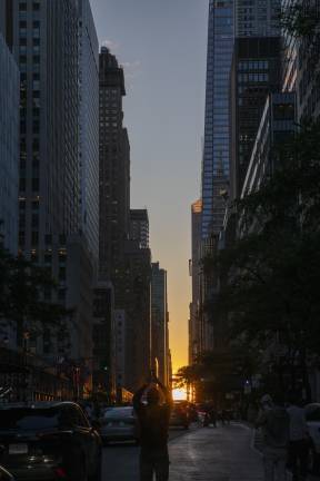 Manhattanhenge sunset visible from East 42nd Street and First Avenue.