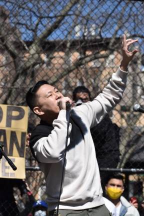 The first Asian American solo rapper to be signed to a major record label, MC Jin, performs in Columbus Park on March 20. Photo: Leah Foreman