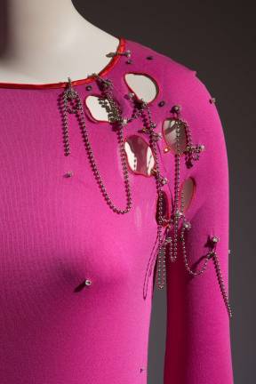 English designer Zandra Rhodes created a punk-pink outifit with chains, holes and rhinestone studs.Zandra Rhodes, ensemble, 1978, England, museum purchase. Photo: &#xa9; The Museum at FIT