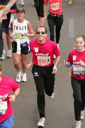 Richard Bernstein, famed as the &quot;blind New York City marathoner,&quot; competes in the 2009 Marathon. Bernstein, who later became a Michigan Supreme Court Justice, was hit by a speeding bicyclist in Central Park in 2012 before what would have been his 18th&#xa0;marathon.Photo: Achilles International, via Justice Richard Bernstein