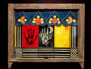 In The Palmist Window from 1967, Betye Saar's found objects along with painted imagery are vivid and evocative.