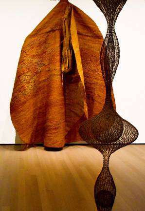 A dense, pendulous weaving by Magdalena Abakanowicz couldn&#x2019;t be more different from Ruth Asawa's floating forms, yet both were part of a movement to relocate fiber from the craft shelf to the art gallery. Photo: Adel Gorgy