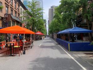 Roadside dining sheds such as the one on the right would be permitted, but only with the restriction that they would have to be taken down over the wintertime. Outdoor sidewalk dining will be allowed year-round. Photo: Ralph Spielman