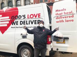 Fred, a driver for God's Love We Deliver, with meals ready to be delivered.