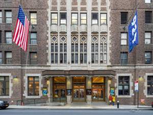 The main entrance to the 92NY, which finds itself embroiled in controversy. The Jewish cultural organization cancelled an appearance by an author after he signed a letter calling for a ceasefire in the latest Israel-Palestine war, leading to staff resignations.