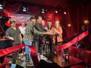 Cutting the ribbon (center, left to right): Council Member Shaun Abreu, Smoke co-owners Paul Stache and Molly Johnson, jazz drummer Al Foster and Council Member Gale Brewer. Photo courtesy of Shaun Abreu