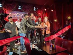 Cutting the ribbon (center, left to right): Council Member Shaun Abreu, Smoke co-owners Paul Stache and Molly Johnson, jazz drummer Al Foster and Council Member Gale Brewer. Photo courtesy of Shaun Abreu