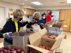 Packing bags is part of the experience. Photo courtesy of Gale Brewer’s Office