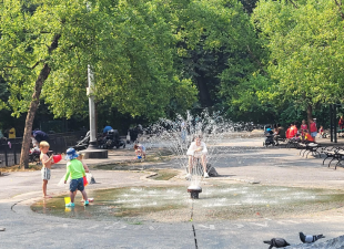 A view of the current “splash zone” and inbuilt-stream at River Run Playground, off W. 82nd St. The park was set to lose said river during a proposed overhaul, but community rage has forced the city to reverse course.