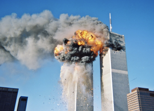 Both the South and North Towers burning on the morning of September 11, 2001. American Airlines Flight 11 was flown into the North Tower at 8:46 a.m. 17 minutes later United Airlines Flight 175 struck the South Tower at 9:03 a.m.