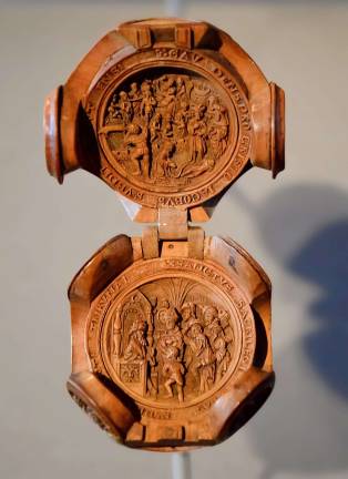 A prayer bead depicting the Legend of Saint James the Greater made in the Netherlands in the 16th century is just 2-1/4 &#xd7; 1-7/8 inches in diameter. Photo: Adel Gorgy