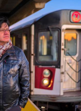 Carlos Aguasaco in the subway. Photo courtesy of Carlos Aguasaco